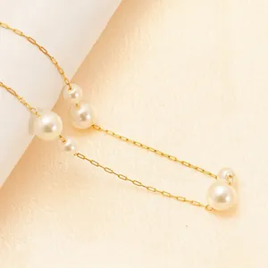 Elegant 18K gold plated stainless steel necklace featuring graduated white pearls