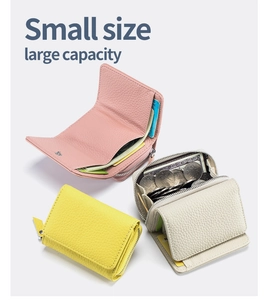 Three-fold leather wallets in pink, yellow, and beige with large capacity design