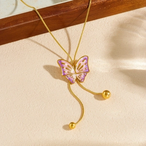 Golden butterfly necklace with pink purple gradient enamel and elegant fringe tassel detail