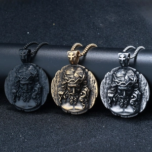 Detailed relief of Jesus with crown of thorns on black, bronze and silver pendants