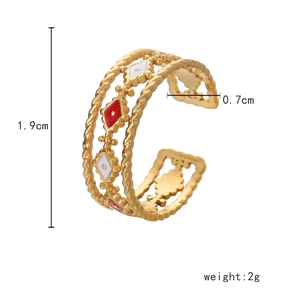 Detailed view of golden woven ring with red and white enamel diamond patterns and size specs