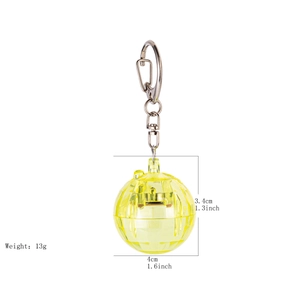 Yellow disco ball keychain with dimensions 4cm x 3.4cm and weight of 13g shown on white background