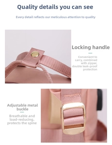 Pink diaper backpack detail featuring secure lock handle and adjustable metal buckles
