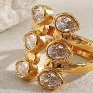 Macro shot of 18K gold plated double layer ring with six pear-cut zircon stones