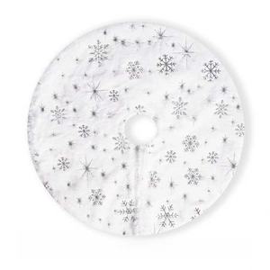 Detailed top view of a white plush Christmas tree skirt with silver snowflake patterns