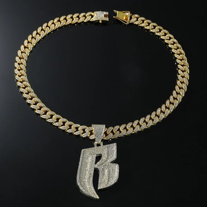 Men's hip hop gold Cuban link chain necklace featuring a luxury iced out letter B pendant