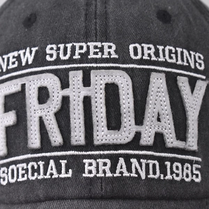Classic washed cotton baseball cap with vintage Friday embroidery and 1985 text