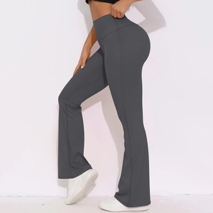 Detail of high-waist charcoal grey flare yoga pants with slimming compression fit