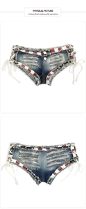 Dettaglio di pantaloncini di jeans con lacci laterali e motivo a stelle della bandiera