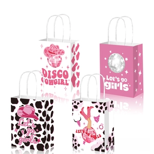 Disco Cowgirl themed paper gift bags with handles in pink and cow print patterns