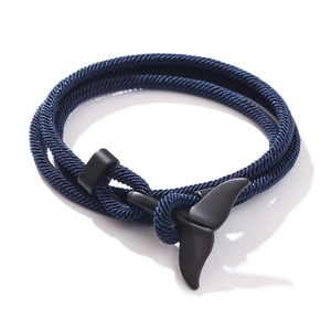 Ocean-themed multi-layer woven blue rope bracelet with a black whale tail metal clasp