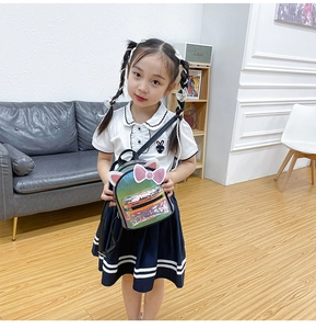 Toddler girl wearing laser gradient backpack with cat ears and sequin clear pocket