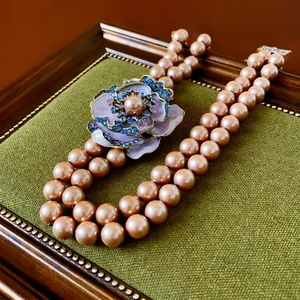 Vintage double-layer champagne pearl necklace with luxury floral enamel pendant