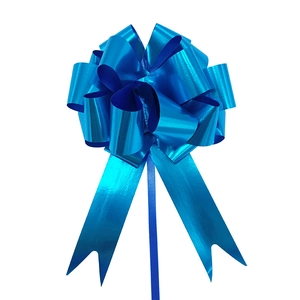 Detailed view of 3D metallic blue pull bow ribbon for elegant gift and flower packaging