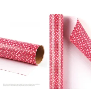 Papier cadeau en papier d'art 80g avec motifs géométriques floraux blancs sur fond rouge