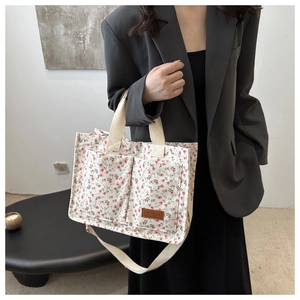 Floral canvas tote bag with red flowers and adjustable shoulder strap for women