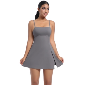 Detail of dark grey sports dress featuring slim straps and a side slit for tennis and fitness