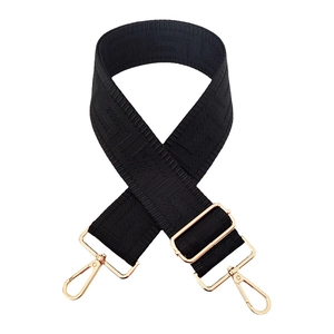 Adjustable wide black replacement bag strap with woven geometric pattern and gold hardware