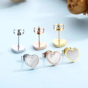 Three pairs of heart-shaped stainless steel stud earrings with white shell inlay