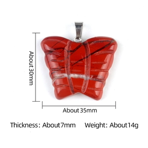 Red jasper butterfly crystal pendant with metal clasp and size dimensions on white background