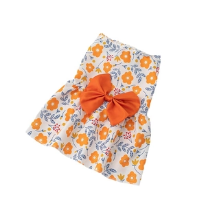 Cute white pet floral dress with orange flowers and a large bow for small dogs