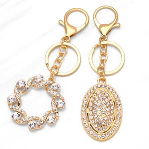 Moda Oro Lega Strass Portachiavi Borsa Ciondolo Geometrico Girasole Cavo Spirale Ovale Decorazione Per Borsetta