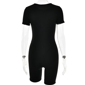 Rear view of a tight-fitting black short-sleeved bodysuit with zipper on a clear mannequin