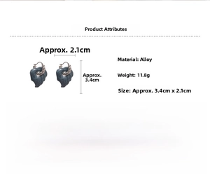 Detail of leaf-shaped heart earrings showing size 3.4x2.1cm and 11.8g alloy weight