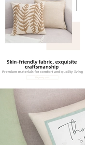 Detailed close-up of textured cotton-linen fabric with leaf embroidery and fine stitching