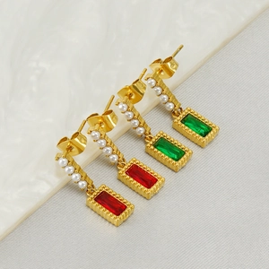 French vintage gold earrings with emerald and ruby stones paired with vertical pearls
