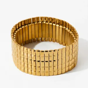 Detail of gold-plated stainless steel stretch bracelet with ribbed brick-style segments
