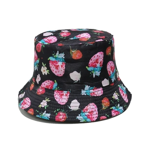 Black cotton bucket hat with vibrant strawberry pattern print and cute white flowers