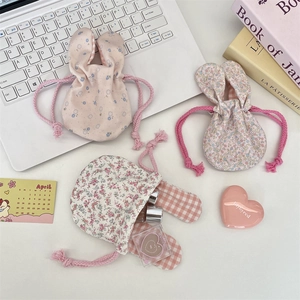 Floral drawstring storage bags with cute bunny ears for makeup and cosmetics organization