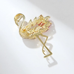 Fashionable golden flamingo brooch with crystal accents for suits and coats