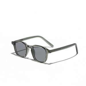 Retro TR90 sunglasses with transparent grey-green frames and dark grey polarized lenses
