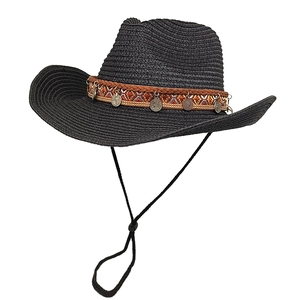 Black western straw cowboy hat with ethnic coin band and wide brim for sun protection