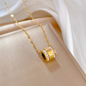 Minimalist gold titanium steel necklace with Roman numerals and zircon cylinder pendant