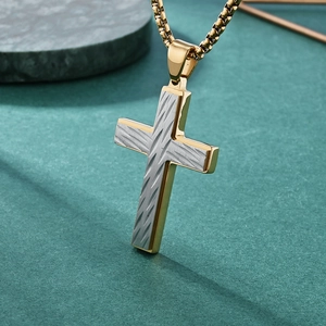 Men's gold and silver cross pendant necklace with textured two-tone finish and box chain