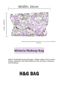 Detail view of purple floral jacquard makeup bag with 26x18cm dimension labels