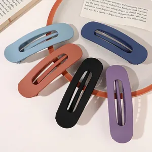 Matte finish oval hair clips set in five colors including navy blue and brick red