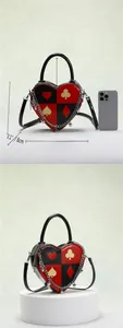Detailed dimension view of heart-shaped poker pattern crossbody bag with size markers