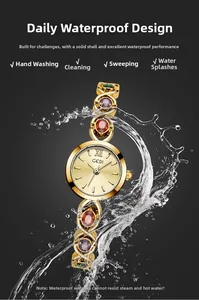 Montre bijoux dorée étanche pour femme avec gemmes colorées et bracelet à maillons infinis
