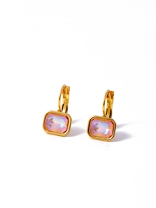Detail of gold rectangular earrings featuring gradient purple and pink zircon stones