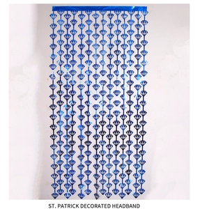 Close-up of blue metallic foil fringe curtain with hollow diamond pattern for party backdrop