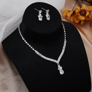 Sparkling silver zircon necklace and earring set with pear-shaped drops for evening gowns