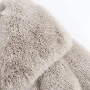 Close-up of soft grey faux fur texture with high density and silky luxury fibers