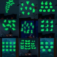 Glow in the dark Halloween stickers featuring glowing bats and pumpkin patterns in green