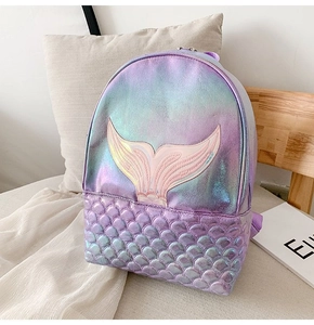 Detailed view of the mermaid tail embroidery and scaly texture on the laser glitter backpack