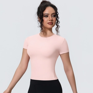 Detailed close-up of pink slim fit sports t-shirt with soft breathable micro-texture fabric