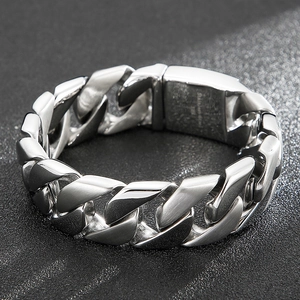 Macro shot of 20mm Cuban chain bracelet with matte and polished steel finishes
